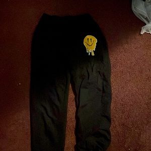 Sweatpants with drip smiley face